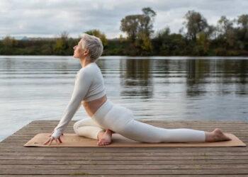 Boost Your Flexibility: Essential Stretches for Pre- and Post-Workout - Natalya Ugryumova/iStockphoto/Getty Images