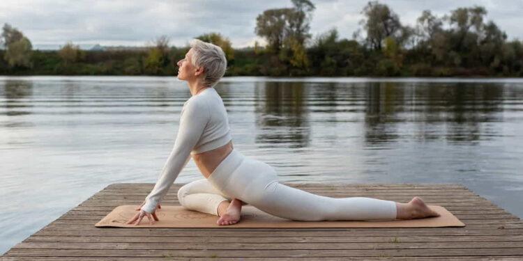 Boost Your Flexibility: Essential Stretches for Pre- and Post-Workout - Natalya Ugryumova/iStockphoto/Getty Images