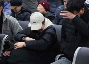 Jeju Air Crash Survivors Rescued from Tail Section Amid Wreckage - Kim Hong-Ji/Reuters