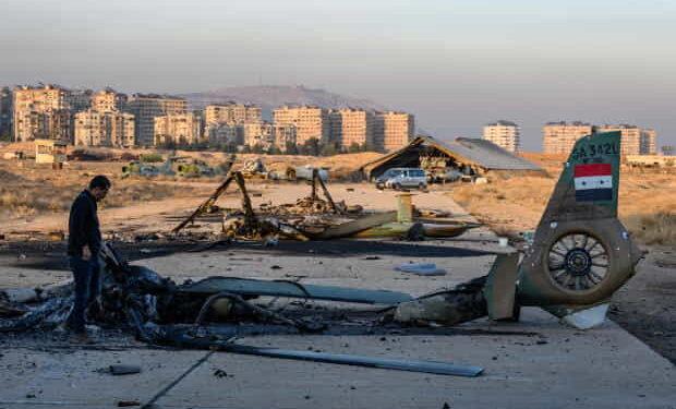 Syria's Military Infrastructure in Ruins After Israeli Airstrikes and Rebel Takeover - Scott Peterson/Getty Images
