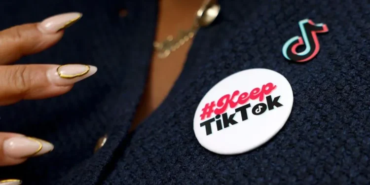Will TikTok Be Banned? Supreme Court to Hear the Case - A TikTok creator wears a badge in support of the platform - Getty Images