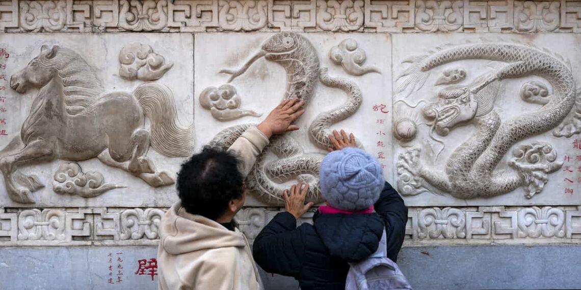 Year of the Snake 2025: Your Zodiac Forecast for the Lunar New Year - Andy Wong/AP
