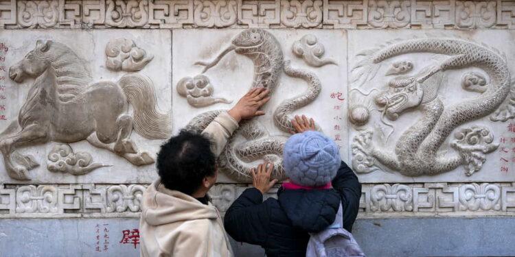 Year of the Snake 2025: Your Zodiac Forecast for the Lunar New Year - Andy Wong/AP