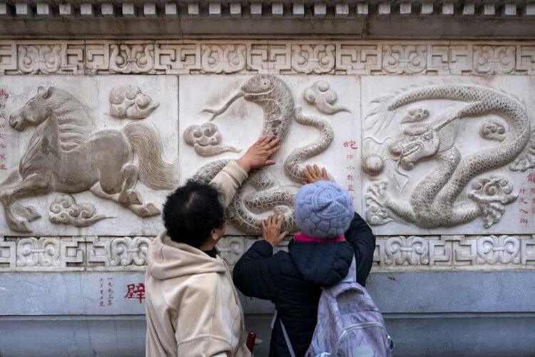 Year of the Snake 2025: Your Zodiac Forecast for the Lunar New Year - Andy Wong/AP