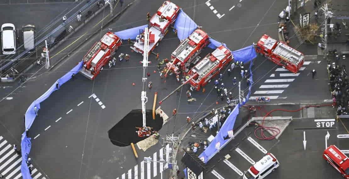 Rescue Operation Underway for Driver Trapped in Growing Sinkhole Near Tokyo - Kenichiro Kojima/AP Photo