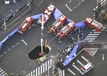 Rescue Operation Underway for Driver Trapped in Growing Sinkhole Near Tokyo - Kenichiro Kojima/AP Photo