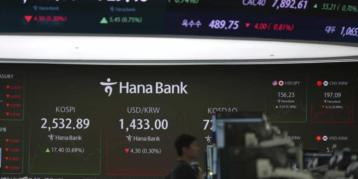 How China’s AI Push Is Impacting US Tech Stocks and Markets - Lee Jin-man/AP Photo