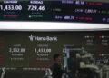 How China’s AI Push Is Impacting US Tech Stocks and Markets - Lee Jin-man/AP Photo