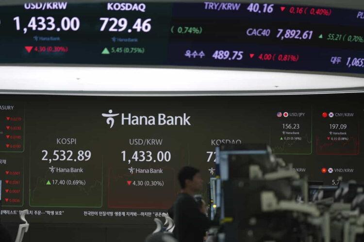 How China’s AI Push Is Impacting US Tech Stocks and Markets - Lee Jin-man/AP Photo