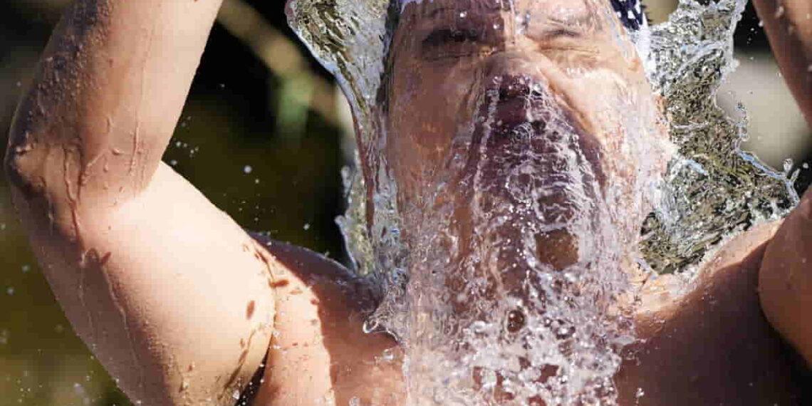 The Power of Ice: How Japanese Shrine Goers Purify Themselves for the New Year - Eugene Hoshiko/AP Photo