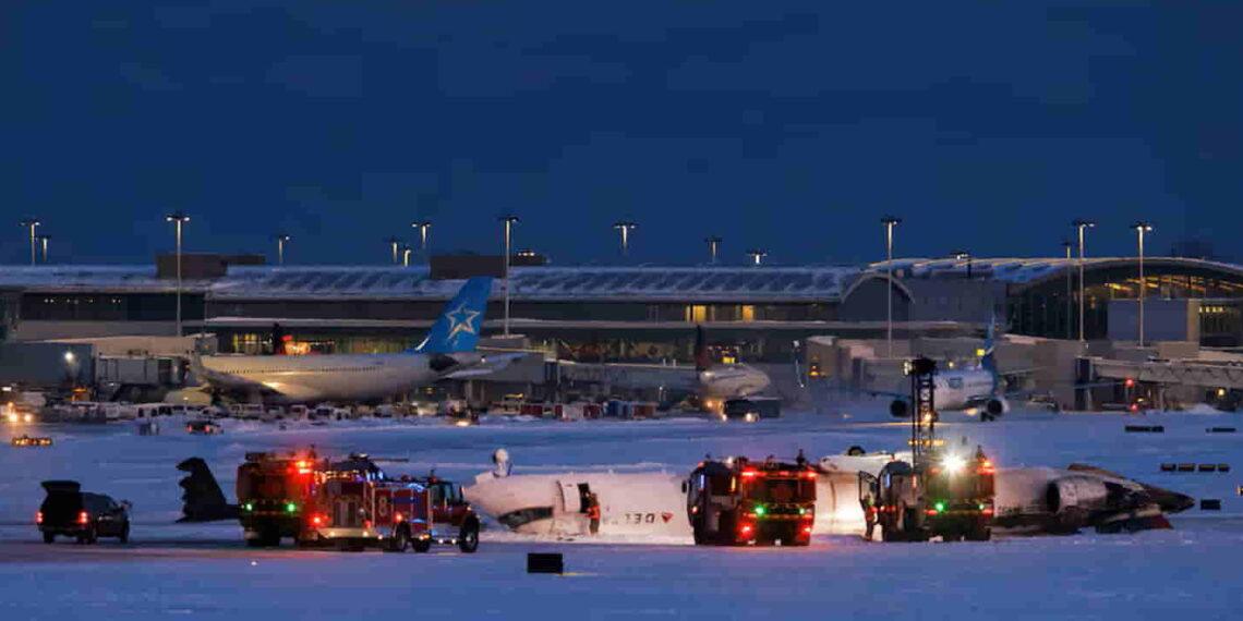 18 Injured as Delta Plane Crashes and Flips at Toronto Airport - Cole Bursto/REUTERS
