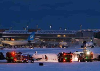 18 Injured as Delta Plane Crashes and Flips at Toronto Airport - Cole Bursto/REUTERS