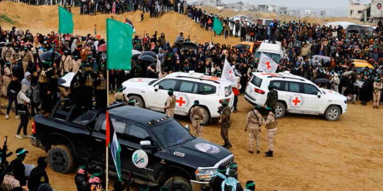 Gaza Handover: Bodies of Two Young Hostages Spark National Grief - Hatem Khaled/REUTERS