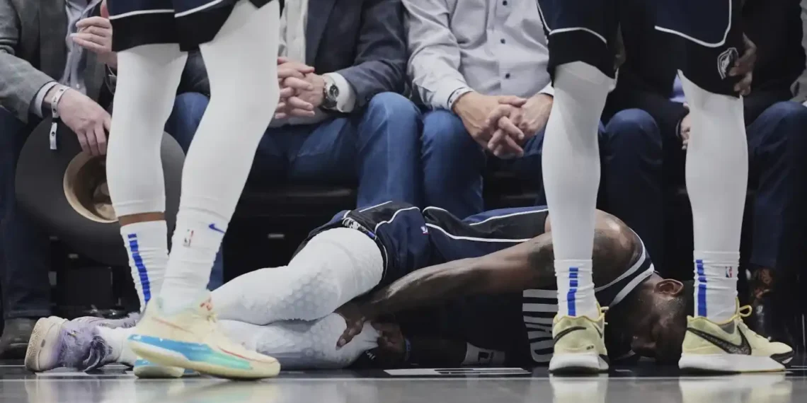 Mavs' Kyrie Irving Injures Knee, Continues Playing Long Enough to Shoot Free Throws - Tony Gutierrez/AP Photo