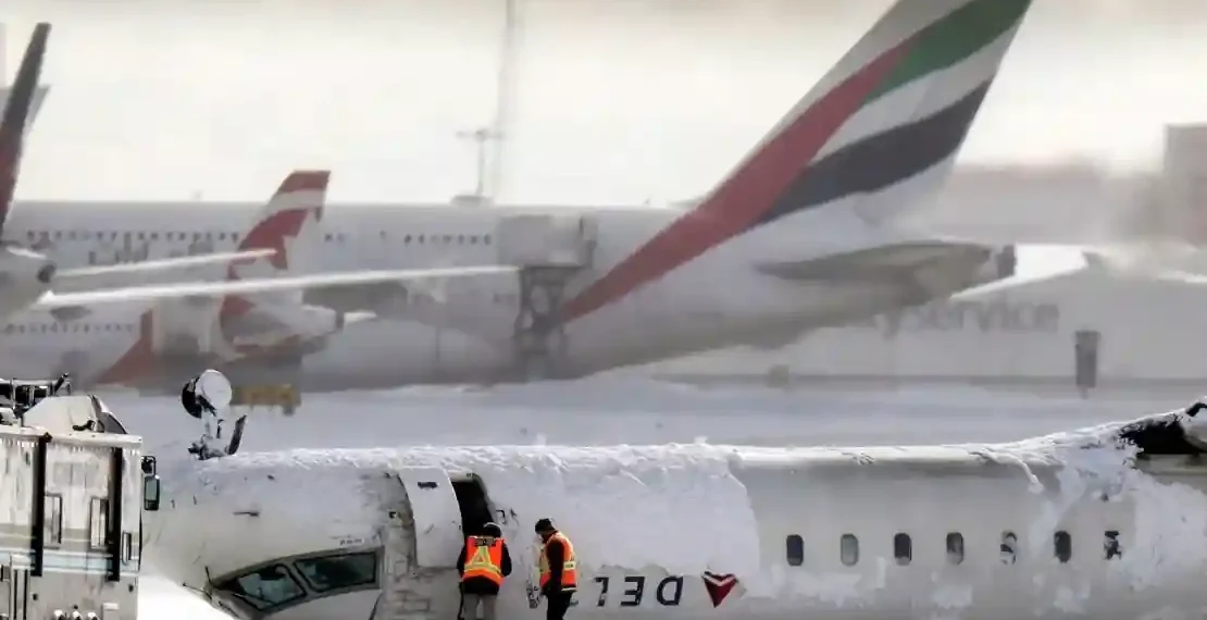 Inside the Toronto Plane Crash: One Passenger’s Unbelievable Escape - Chris Young/The Canadian Press/AP