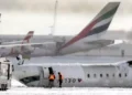 Inside the Toronto Plane Crash: One Passenger’s Unbelievable Escape - Chris Young/The Canadian Press/AP