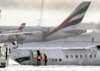 Inside the Toronto Plane Crash: One Passenger’s Unbelievable Escape - Chris Young/The Canadian Press/AP
