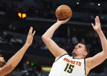 Jokić Sets Record with 61 Points, But Nuggets Lose in Double Overtime Classic - David Zalubowski/AP via CNN