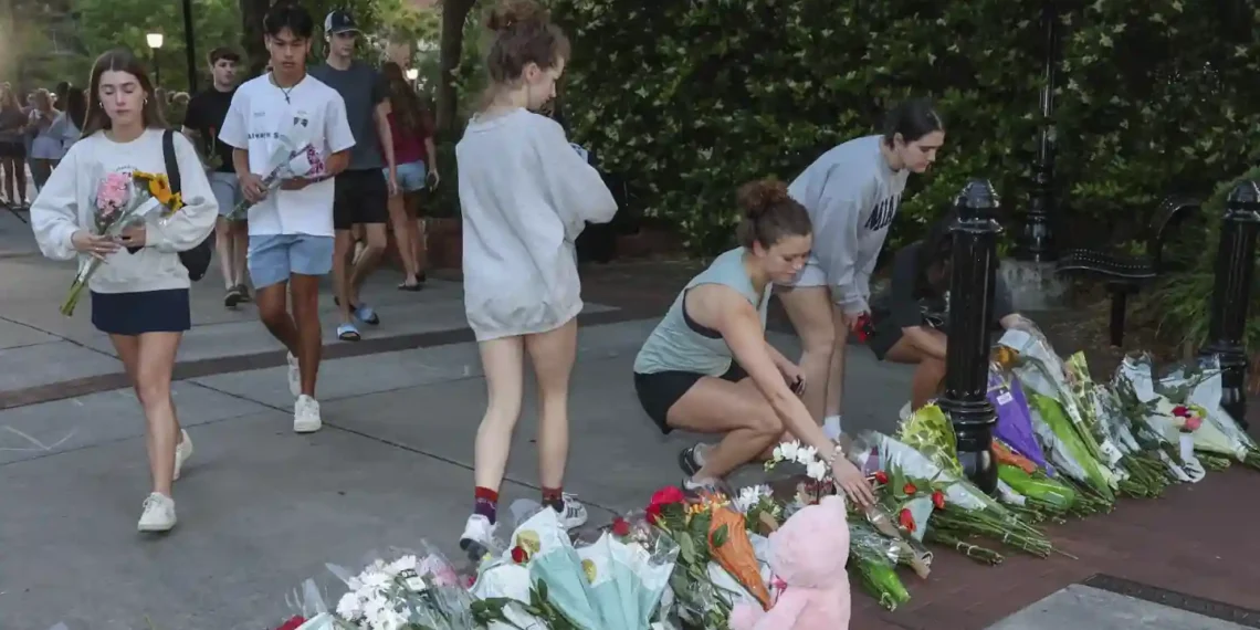 FSU Students Honor Victims and Begin Healing After Campus Tragedy - Gary McCullough/AP Photo