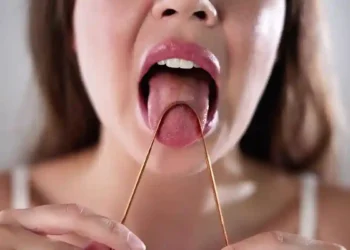 Can Tongue-Scraping Harm Your Heart? Here's What You Need to Know - image credit to iStock via FOX News