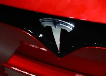 Tesla Faces Major Losses: Musk Eyes Return to Core Business - Jakub Porzycki/NurPhoto/Getty Images