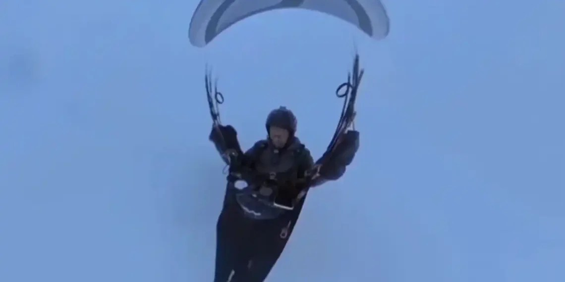 Chinese Man Accidentally Soars Into Sky During Paragliding Test - CCTV via Reuters