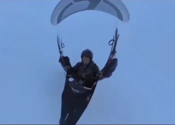 Chinese Man Accidentally Soars Into Sky During Paragliding Test - CCTV via Reuters