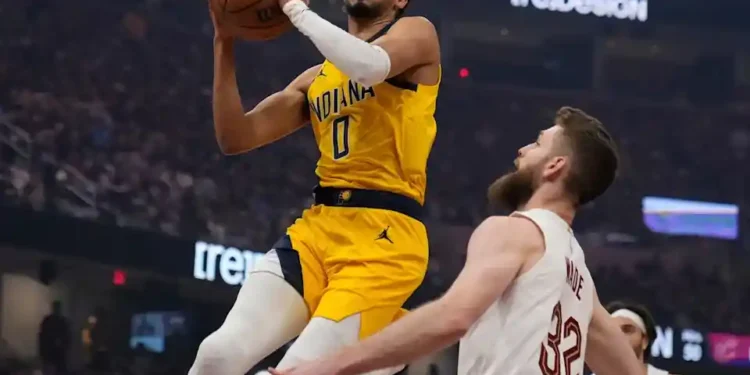 Pacers Close Strong to Beat Cavs and Take Home-Court Advantage - AP/Sue Ogrocki