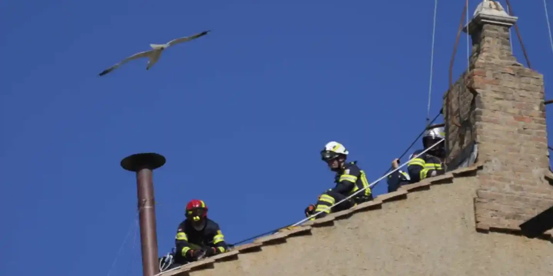 Cardinals Meet as Chimney Signals Countdown to New Pope - AP Photo/Gregorio Borgia, File