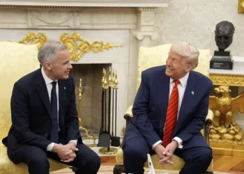 Trump’s Tariffs and Canada’s Future: A Divisive Oval Office Meeting - Adrian Wyld/The Canadian Press via AP