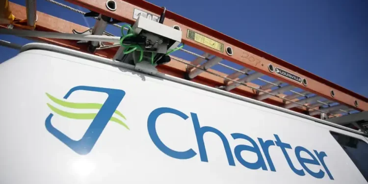 $34.5 Billion Merger: Charter and Cox Combine to Stay Competitive - AP Photo/Jeff Roberson, File