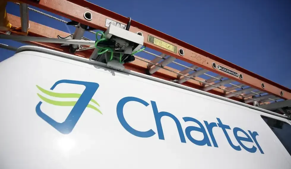 $34.5 Billion Merger: Charter and Cox Combine to Stay Competitive - AP Photo/Jeff Roberson, File