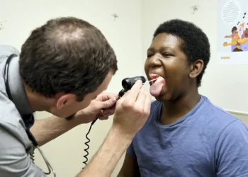 Local Voices Silenced as Federal Vaccine Study Is Axed - Thomas Peipert/AP Photo