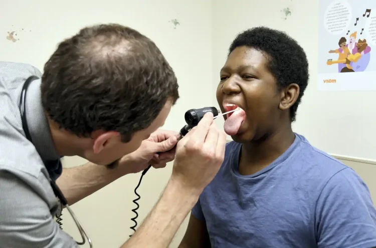 Local Voices Silenced as Federal Vaccine Study Is Axed - Thomas Peipert/AP Photo