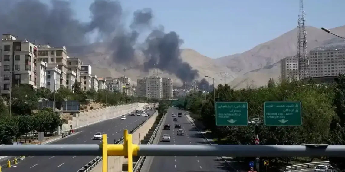 Iran on Edge: Posters Warn Citizens to Report Sunglasses, Screams, and Packages - Vahid Salemi/AP