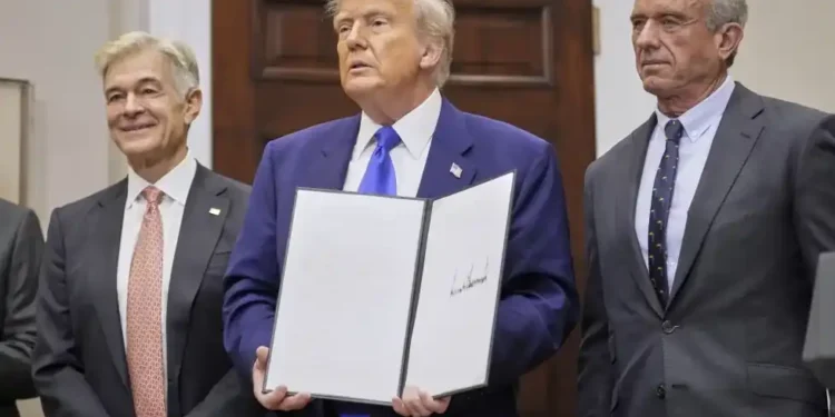 Is the U.S. Subsidizing Global Healthcare? Experts Disagree - AP Photo/Mark Schiefelbein