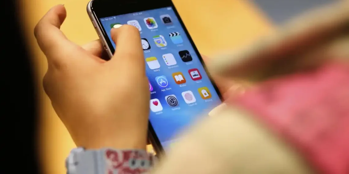 U.S. Phones Hacked Without a Click — Is China Behind It? - AP Photo/Kiichiro Sato, File