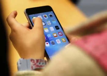 U.S. Phones Hacked Without a Click — Is China Behind It? - AP Photo/Kiichiro Sato, File