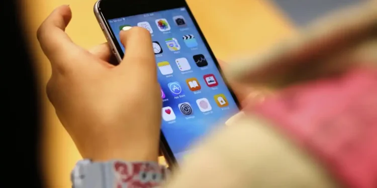 U.S. Phones Hacked Without a Click — Is China Behind It? - AP Photo/Kiichiro Sato, File