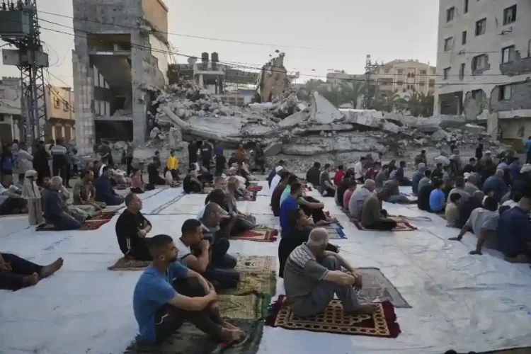 Eid in Gaza: Prayers in the Rubble, Food Supplies Running Low - AP Photo/Abdel Kareen Hana