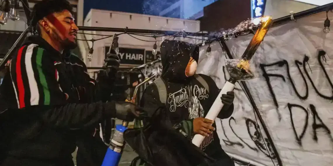 Craigslist Job Post Was for a Podcast Stunt — Not Proof of Fake Protests - AP Photo/Ethan Swope