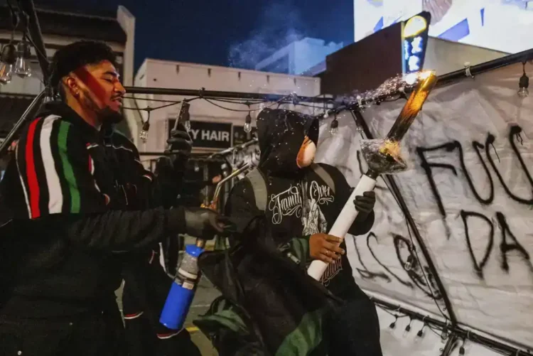 Craigslist Job Post Was for a Podcast Stunt — Not Proof of Fake Protests - AP Photo/Ethan Swope