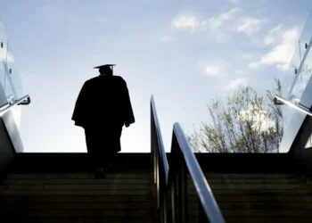 From Caps to Crises: Why Graduates Are Struggling to Get Hired - Aaron Hawkins/iStockphoto/Getty Images