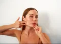 The Truth About Face Yoga, According to Dermatologists - Oscar Gutierrez Zozulia/iStockphoto/Getty Images