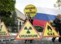 Macron Statue Protest Heats Up Over France’s Russian Energy Imports - Benoit Tessier/Reuters