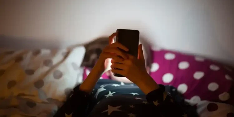 New Study Links Early Smartphone Use to Emotional Struggles in Children, Especially Girls - Elva Etienne/Moment RF/Getty Images