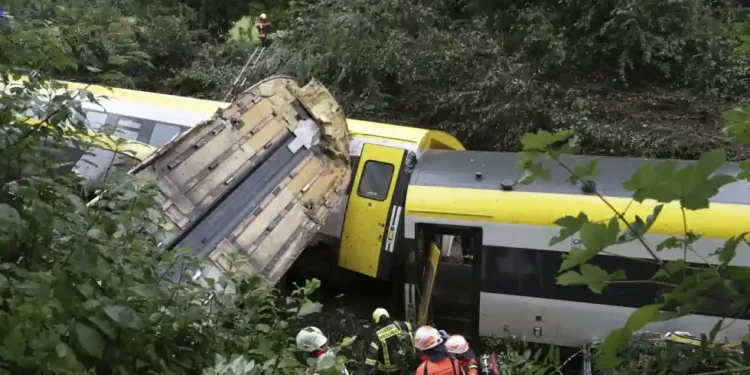Train Derails in Forested Area of Germany—Landslide Possible Cause, Officials Say - Thomas Warnack/dpa via AP