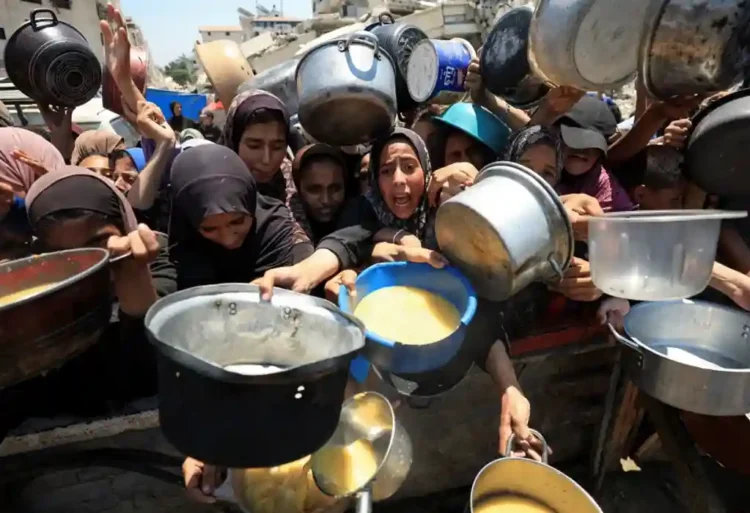 Starvation in Gaza: Will Israel’s Tactical Pause Be Enough to Prevent More Deaths? - Ebrahim Hajjaj/Reuters