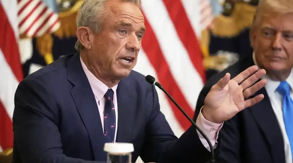 RFK Jr. Ends Funding for COVID-19 and Flu mRNA Vaccines Amid Expert Warnings - AP Photo/Mark Schiefelbein