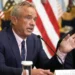 RFK Jr. Ends Funding for COVID-19 and Flu mRNA Vaccines Amid Expert Warnings - AP Photo/Mark Schiefelbein